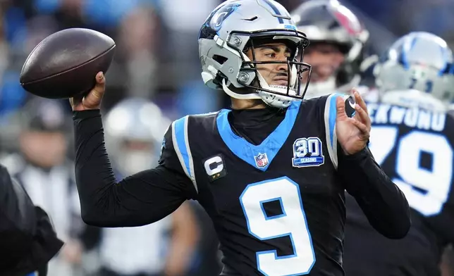 Carolina Panthers quarterback Bryce Young passes against the Tampa Bay Buccaneers during the first half of an NFL football game, Sunday, Dec. 1, 2024, in Charlotte, N.C. (AP Photo/Rusty Jones)