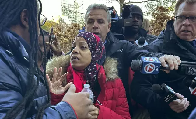 Boston City Council member Tania Fernandes Anderson leaves federal court in Boston after pleading not guilty to five counts of wire fraud and one count of theft on Friday, Dec. 6, 2024 in Boston. (AP Photo/Steve LeBlanc)