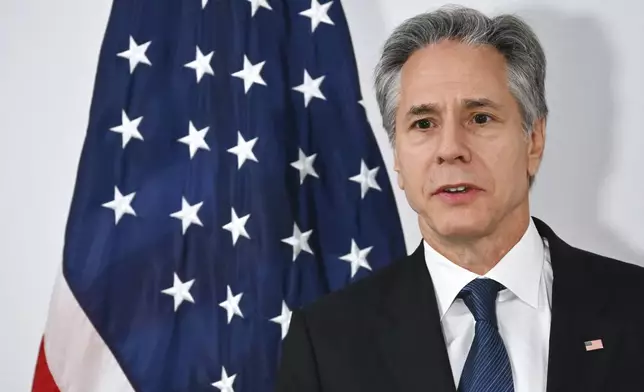 U.S. Secretary of State Antony Blinken looks on as he receives the Royal Order of the Polar Star ahead of the start of the 31st Organization for Security and Cooperation in Europe (OSCE) Ministerial summit, in Ta'Qali, Malta, Thursday, Dec. 5, 2024. (Alberto Pizzoli/Pool Photo via AP)