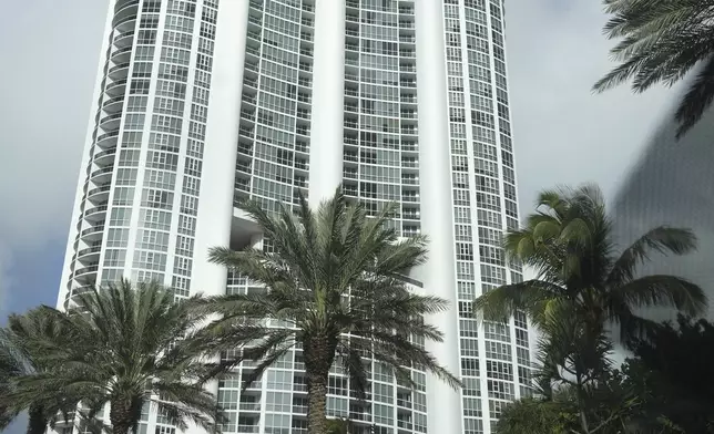 The Trump Grande is shown along Collins Avenue in Sunny Isles Beach, Fla., Tuesday, Dec. 17, 2024. (AP Photo/Lynne Sladky)