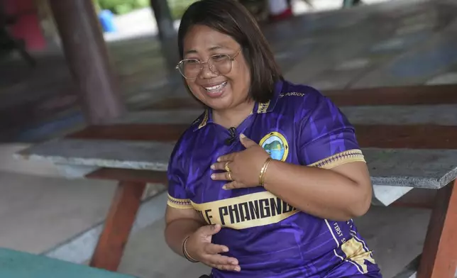 Wilasnee Klathale speaks to reporters during an interview with The Associated Press at Moken village at Surin Islandin Phang Nga Province, Thailand, Thursday, Dec. 12, 2024, (AP Photo/Sakchai Lalit)