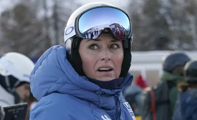 United States' Lindsey Vonn looks on before competing in an alpine ski, women's World Cup super G, in St. Moritz, Switzerland, Saturday, Dec. 21, 2024. (AP Photo/Giovanni Auletta)