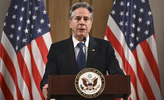 US Secretary of State Antony Blinken delivers a statement to the press after the meeting with the foreign ministers of the Arab Contact Group on Syria in Jordan's southern Red Sea coastal city of Aqaba, Saturday Dec. 14, 2024. (Andrew Caballero-Reynolds/Pool via AP)