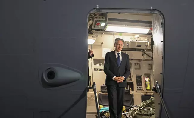 US Secretary of State Antony Blinken waits to disembark from a plane in Jordan's Red Sea resort of Aqaba, on Friday, Dec. 13, 2024. (Andrew Caballero-Reynolds/Pool Photo via AP)