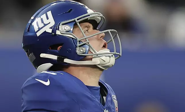 New York Giants quarterback Drew Lock (2) reacts during the fourth quarter of an NFL football game against the New Orleans Saints, Sunday, Dec. 8, 2024, in East Rutherford, N.J. (AP Photo/Adam Hunger)