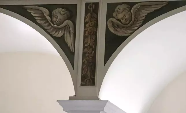 Recently restored, nearly 300-year-old painted angels adorn an arch at the historic Old North Church in the North End neighborhood, Friday, Dec. 20, 2024, in Boston. (AP Photo/Charles Krupa)