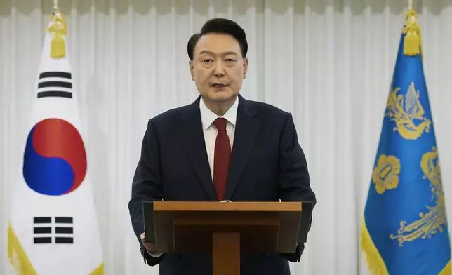 FILE - In this photo released by South Korean President Office via Yonhap, South Korean President Yoon Suk Yeol speaks at the presidential residence in Seoul, South Korea, on Dec. 14, 2024. (South Korean Presidential Office/Yonhap via AP, File)