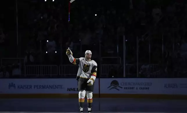 Vegas Golden Knights center Tomas Hertl gestures while being introduced before an NHL hockey game against the San Jose Sharks, Friday, Dec. 27, 2024, in San Jose, Calif. (AP Photo/Godofredo A. Vásquez)