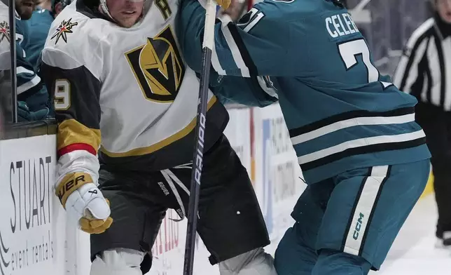 San Jose Sharks center Macklin Celebrini, right, fouls Vegas Golden Knights center Jack Eichel during the first period of an NHL hockey game, Friday, Dec. 27, 2024, in San Jose, Calif. (AP Photo/Godofredo A. Vásquez)