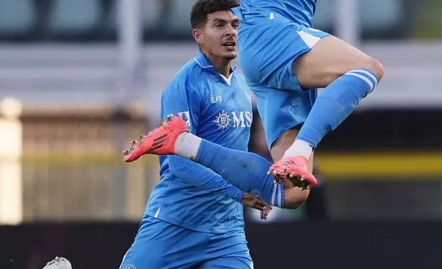 Napoli's Scott McTominay celebrates after scoring his side's first goal during the Serie A soccer match between Torino FC and SSC Napoli the Stadio Olimpico Grande Torino in Turin, north west Italy, Sunday, Nov. 24, 2024. (Fabio Ferrari/LaPresse via AP)