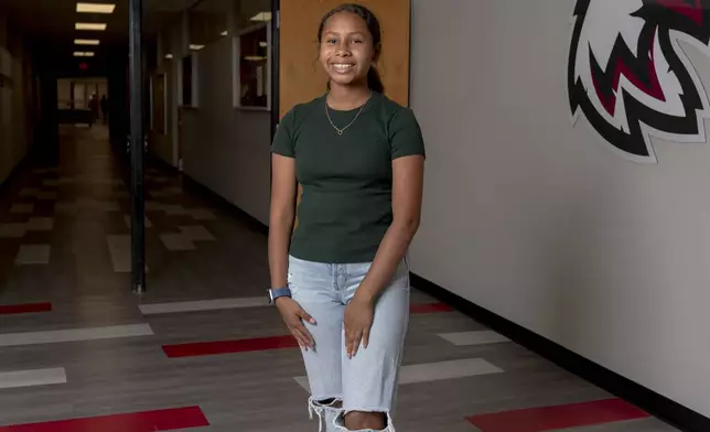 Senior Happy Belle Shortman, who is who is Kiowa, Cheyenne and Arapaho, poses for a portrait at Watonga High School on Wednesday, Oct. 2, 2024, in Watonga, Okla. (AP Photo/Nick Oxford)