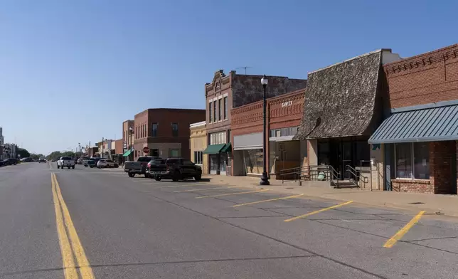 Empty storefronts sit on Main Street on Wednesday, Oct. 2, 2024, in Watonga, Okla. (AP Photo/Nick Oxford)