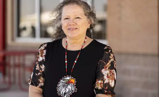 Indian Education Director Hollie Youngbear poses for a portrait at Watonga High School on Wednesday, Oct. 2, 2024, in Watonga, Okla. Youngbear and her colleagues work to connect with families in a way that acknowledges the history and needs of Native communities. (AP Photo/Nick Oxford)