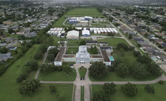 The motherhouse of the Sisters of the Holy Family sits in front of St. Mary's Academy, a private Catholic K-12 school run by the Sisters of the Holy Family, in New Orleans, Wednesday, June 26, 2024. (AP Photo/Jessie Wardarski)