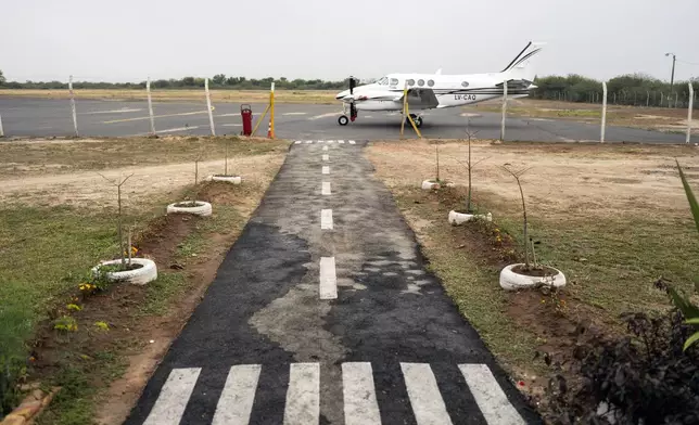 A private aircraft sits parked on the tarmac of the Dr. Luis María Argaña Airport in Mariscal Estigarribia, inthe western region of Paraguay known as the Paraguayan Chaco, Wednesday, Aug. 28, 2024. (AP Photo/Rodrigo Abd)
