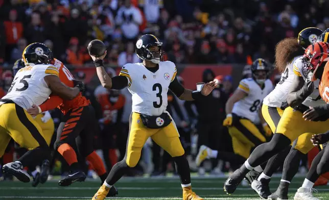 Pittsburgh Steelers quarterback Russell Wilson (3) passes during the first half of an NFL football game against the Cincinnati Bengals, Sunday, Dec. 1, 2024, in Cincinnati. (AP Photo/Jeff Dean)