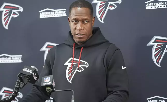 Atlanta Falcons head coach Raheem Morris talks to reporters after an NFL football game, Sunday, Dec. 29, 2024, in Landover, Md. The Commanders won in overtime 30-24. (AP Photo/Stephanie Scarbrough)