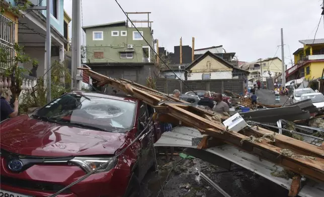 This photo provided by the French Interior Ministry Tuesday, Dec. 17, 2024, shows debris in a street in the Indian Ocean French territory of Mayotte. Survivors wandered through streets littered with debris, searching for water and shelter, after Cyclone Chido leveled entire neighborhoods on Saturday when it hit Mayotte, the poorest territory of France. (Ministere de l'Interieur/DICOM via AP)