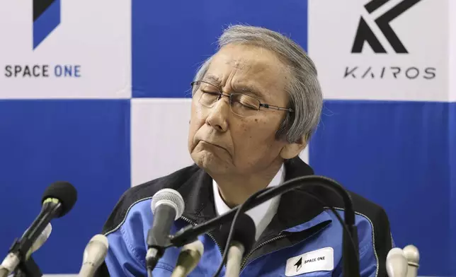 Space One President Masakazu Toyoda reacts during a press conference after its second attempt to launch the Kairos No. 2 rocket carrying satellites into orbit had been aborted minutes after liftoff, in Kushimoto town, western Japan Wednesday, Dec. 18, 2024.(Kyodo News via AP)