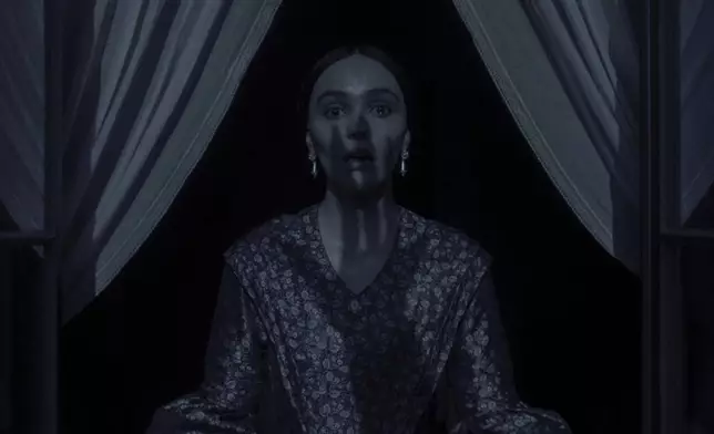 This imaged released by Focus Features shows Lily-Rose Depp in a scene from "Nosferatu". (Focus Features via AP)