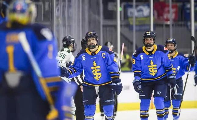 Toronto Sceptres' Blayre Turnbull, center, celebrates after a goal with teammates during first-period PWHL hockey game action against the Boston Fleet in Toronto, Friday, Dec. 27, 2024. (Christopher Katsarov/The Canadian Press via AP)