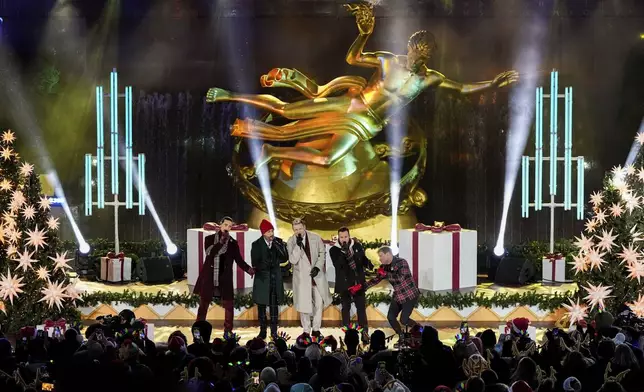 The Backstreet Boys perform during the 92nd annual Rockefeller Center Christmas tree lighting ceremony, Wednesday, Dec. 4, 2024, in New York. (AP Photo/Julia Demaree Nikhinson)