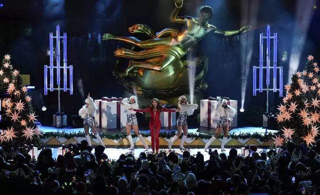 Thalia performs during the 92nd annual Rockefeller Center Christmas tree lighting ceremony, Wednesday, Dec. 4, 2024, in New York. (AP Photo/Julia Demaree Nikhinson)