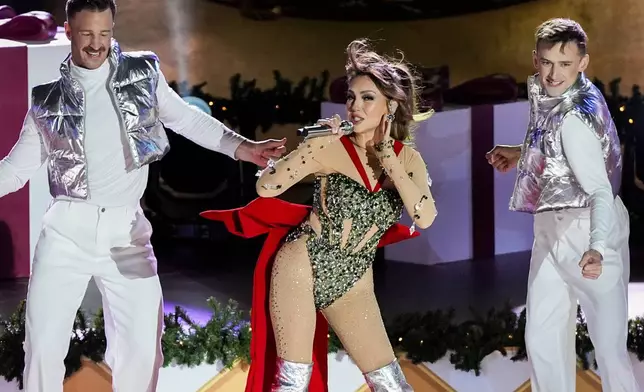 Thalia performs during the 92nd annual Rockefeller Center Christmas tree lighting ceremony, Wednesday, Dec. 4, 2024, in New York. (AP Photo/Julia Demaree Nikhinson)