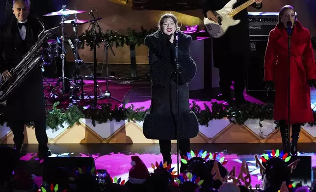 Kelly Clarkson performs during the 92nd annual Rockefeller Center Christmas tree lighting ceremony, Wednesday, Dec. 4, 2024, in New York. (AP Photo/Julia Demaree Nikhinson)