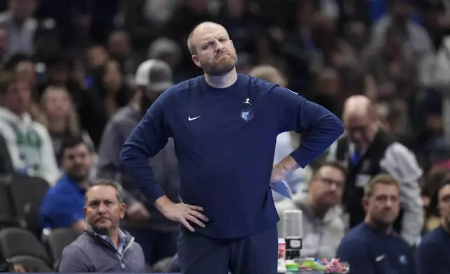 Memphis Grizzlies head coach Taylor Jenkins reacts during the first half of an Emirates NBA Cup basketball game against the Dallas Mavericks, Tuesday, Dec. 3, 2024, in Dallas. (AP Photo/Julio Cortez)