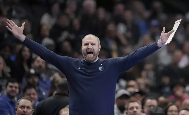 Memphis Grizzlies head coach Taylor Jenkins reacts during the first half of an Emirates NBA Cup basketball game against the Dallas Mavericks, Tuesday, Dec. 3, 2024, in Dallas. (AP Photo/Julio Cortez)