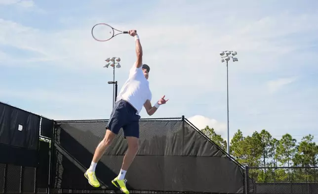 Tennis player Jenson Brooksby practices at the USTA national campus Tuesday, Dec. 10, 2024, in Orlando, Fla. (AP Photo/John Raoux)