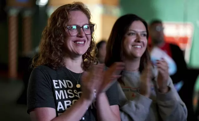 FILE - People only giving there first names Erika, left, and Leeann react after an abortion rights amendment to the Missouri constitution passed, Tuesday, Nov. 5, 2024, at a watch party in Kansas City, Mo. (AP Photo/Charlie Riedel, File)