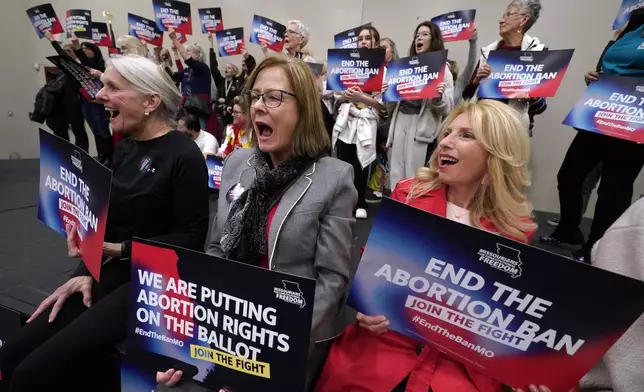 FILE - Missouri residents and pro-choice advocates react to a speaker during Missourians for Constitutionals Freedom kick-off petition drive, Feb. 6, 2024, in Kansas City, Mo. (AP Photo/Ed Zurga, File)