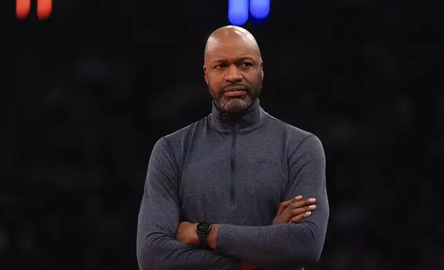 Orlando Magic head coach Jamaal Mosley looks on from the sideline during the first half of an NBA Cup basketball game against the New York Knicks, Tuesday, Dec. 3, 2024, in New York, N.Y. The Knicks won 121-106. (AP Photo/Julia Demaree Nikhinson)