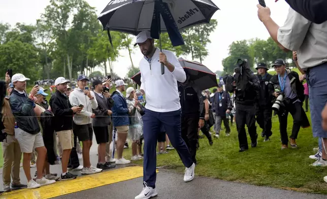 FILE- Scottie Scheffler walks to the tee on the 11th hole during the second round of the PGA Championship golf tournament at the Valhalla Golf Club, Friday, May 17, 2024, in Louisville, Ky. (AP Photo/Jeff Roberson, File)