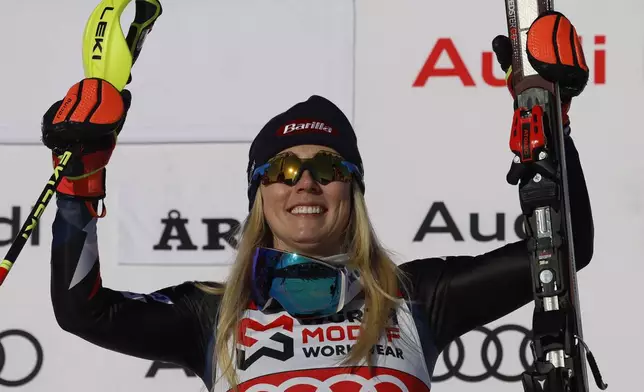 FILE - United States' Mikaela Shiffrin celebrates after winning a women's World Cup slalom skiing event in Are, Sweden, Sunday, March 10, 2024. (AP Photo/Alessandro Trovati, File)