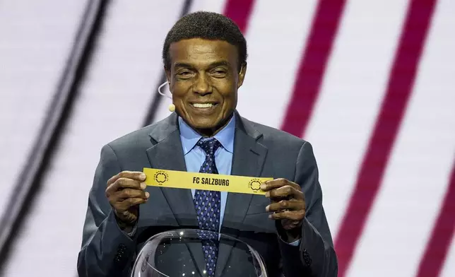 Teófilo Cubillas displays FC Salzburg during the draw for the 2025 FIFA Club World Cup soccer tournament, Thursday, Dec. 5, 2024, in Miami. (AP Photo/Rebecca Blackwell)