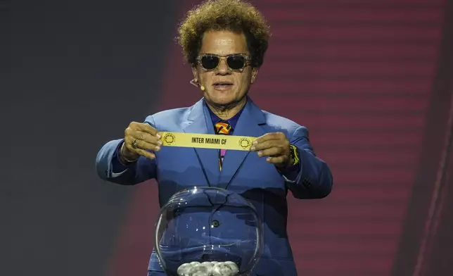 Romero Brito displays Inter Miami CF during the fourth draw for the 2025 FIFA Club World Cup soccer tournament, Thursday, Dec. 5, 2024, in Miami. (AP Photo/Rebecca Blackwell)