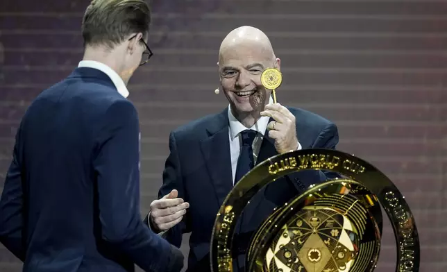 FIFA President Gianni Infantino' speaks during the draw for the 2025 FIFA Club World Cup soccer tournament, Thursday, Dec. 5, 2024, in Miami. (AP Photo/Rebecca Blackwell)