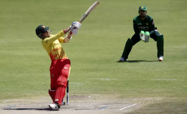 Zimbabwe's Brian Bennett plays a ball during the second T20 cricket match between Zimbabwe and Pakistan at Queens Sports Club in Bulawayo, Zimbabwe, Tuesday, Dec. 3, 2024. (AP Photo/Wonder Mashura)