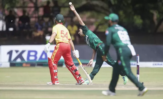 Pakistan's Sufiyan Muqeem bowls during the second T20 cricket match between Zimbabwe and Pakistan at Queens Sports Club in Bulawayo, Zimbabwe, Tuesday, Dec. 3, 2024. (AP Photo/Wonder Mashura)