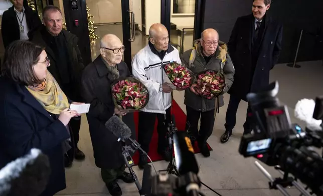 Representatives of this year's Nobel Peace Prize winner Nihon Hidankyo, from left, Terumi Tanaka, Toshiyuki Mimaki and Shigemitsu Tanaka arrive in Gardermoen, Norway Sunday evening, Dec. 8, 2024. (Amanda Pedersen Giske/NTB Scanpix via AP)
