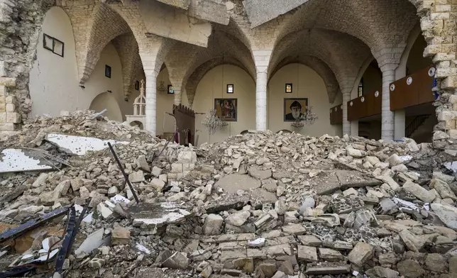 Icons are seen inside St. George Melkite Catholic Church, that was destroyed by Israeli airstrike, in the town of Dardghaya in southern Lebanon, Sunday, Dec. 22, 2024. (AP Photo/Hassan Ammar)