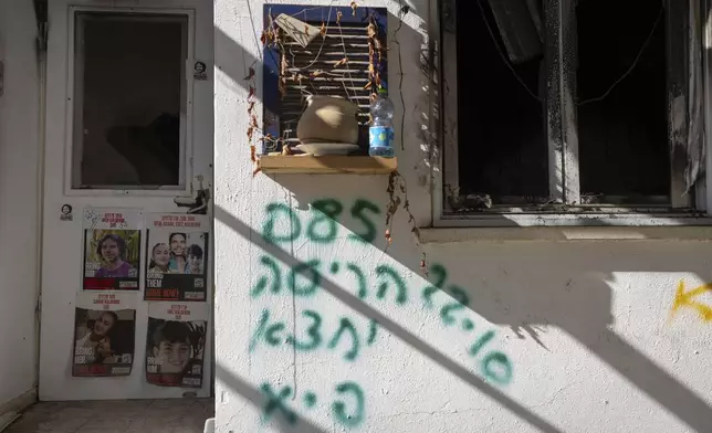 The home of Ofer Kalderon, hostage who were pulled into Gaza by Hamas militants in their Oct. 7, 2023 attack, stands empty after nearly 15 months of war in kibbutz Nir Oz, southern Israel, Thursday Dec. 5, 2024 (AP Photo/Ohad Zwigenberg)