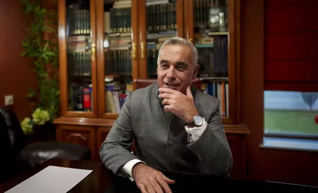 Calin Georgescu, the independent candidate for presidency who won the first round of presidential elections, speaks after an interview with the Associated Press in Izvorani, Romania, Wednesday, Dec. 4, 2024. (AP Photo/Vadim Ghirda)