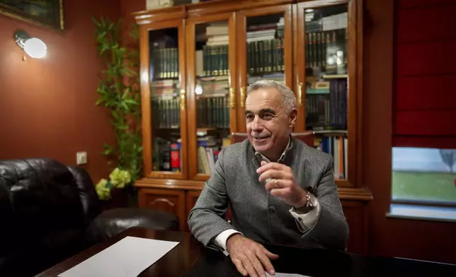 Calin Georgescu, the independent candidate for presidency who won the first round of presidential elections, speaks after an interview with the Associated Press in Izvorani, Romania, Wednesday, Dec. 4, 2024. (AP Photo/Vadim Ghirda)