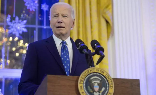 FILE - President Joe Biden speaks during a Hanukkah reception in the East Room of the White House in Washington, Dec. 16, 2024. (AP Photo/Rod Lamkey, Jr., File)