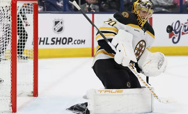 Boston Bruins' Joonas Korpisalo makes a save against the Columbus Blue Jackets' during the second period of an NHL hockey game Friday, Dec. 27, 2024, in Columbus, Ohio. (AP Photo/Jay LaPrete)