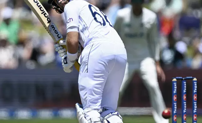 England's Joe Root bats during play on day two of the third cricket test between England and New Zealand in Hamilton, New Zealand, Sunday, Dec. 15, 2024. (Andrew Cornaga/Photosport via AP)